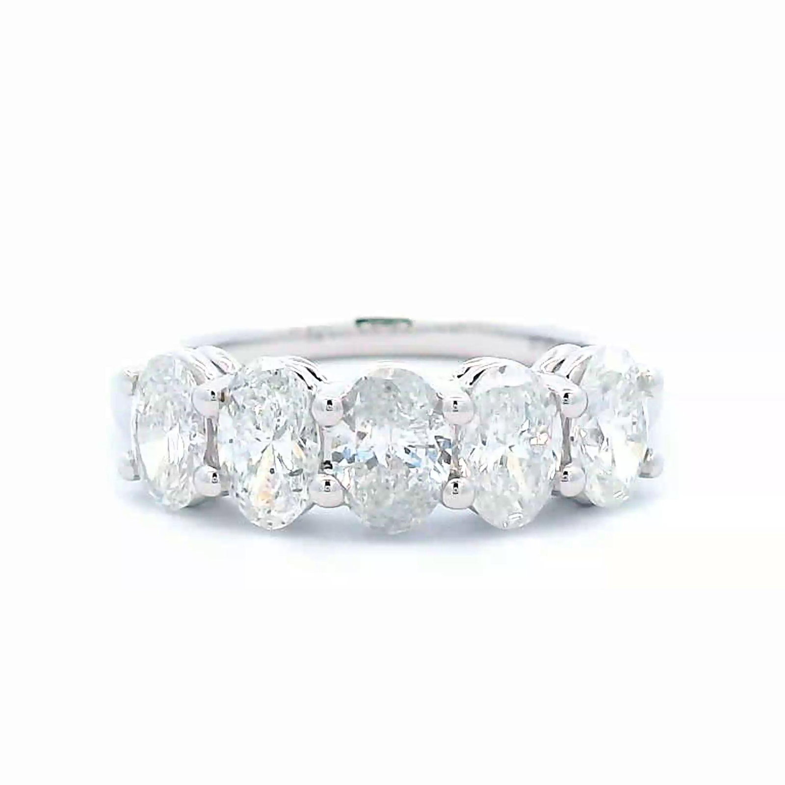 Alexander Beverly Hills 1.48ct Oval Diamond Half Eternity Band 18k White Gold: Stunning oval cut diamond eternity band, by Alexander Beverly Hills.5 oval diamonds, 1.48 carats total. F/G color and SI clarity. Set in 18k white gold, 3.30 grams, size 6.Accommodated with an up to d