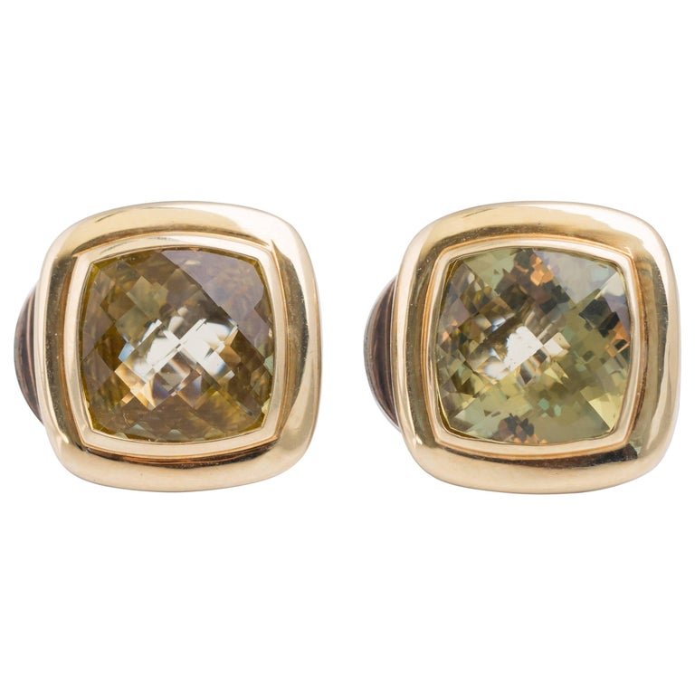 David Yurman Albion Citrine and 18 Karat Gold, Sterling Silver Earrings: David Yurman Albion Earrings - 18 Yellow Gold, Sterling Silver, Lemon CitrineFeatures a cushion cut, faceted Lemon Citrine bezel set in high polish 18 Karat Yellow Gold. A rich, high polish 18 Karat Y