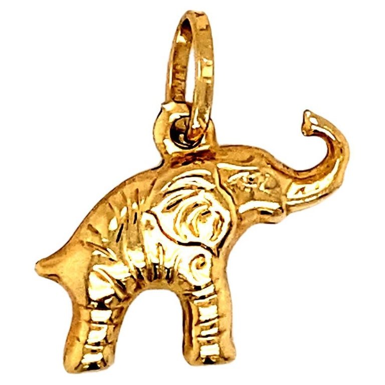 Elephant Charm in 14 Karat Yellow Gold: Circa: 1980sMetal Type: 14 karat goldWeight: 1.4 gramsLength: 21.4mm
