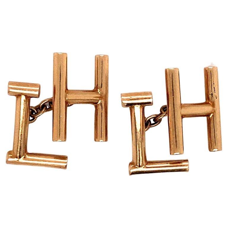 Cartier 1950s "LH" Initial Cufflinks in 14 Karat Rose Gold: Maker: CartierCirca: 1950Origin: FranceMetal Type: 14 Karat Rose Gold Weight: 8.7 grams
