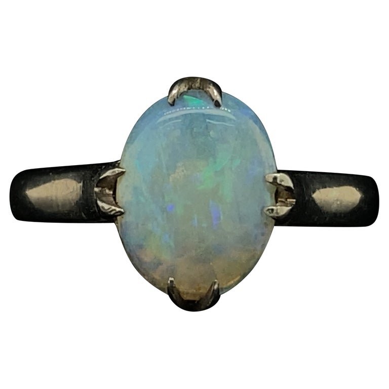 Circa 1910s Edwardian Oval Opal Ring in 14 Karat White Gold (1 of 6)