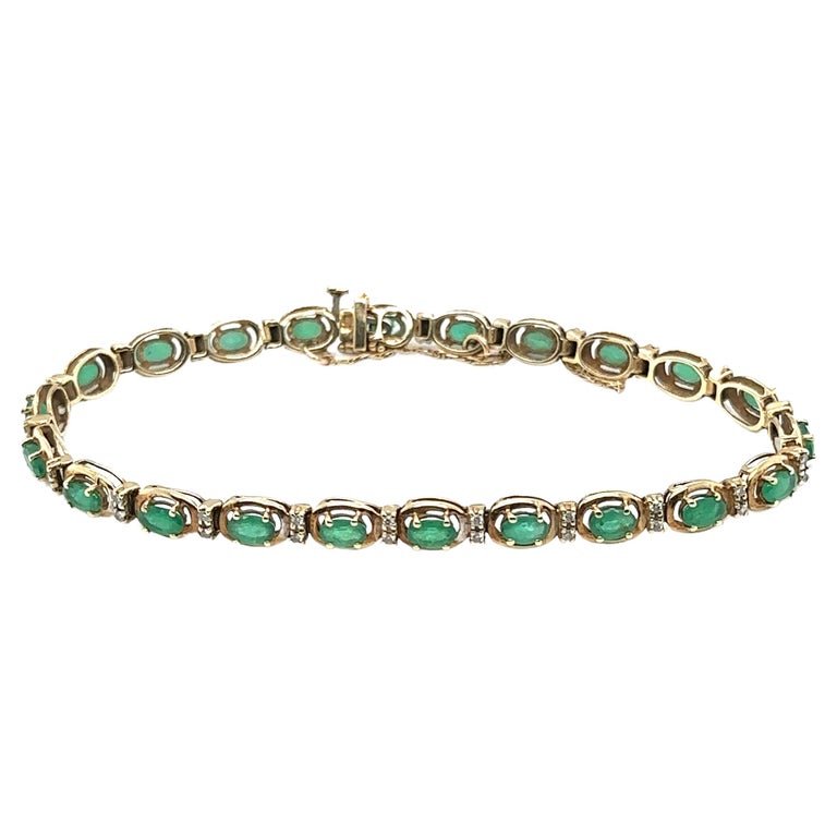 1.25 Carat Total Oval Emerald and Diamond Tennis Bracelet in 14 Karat Gold (1 of 5)