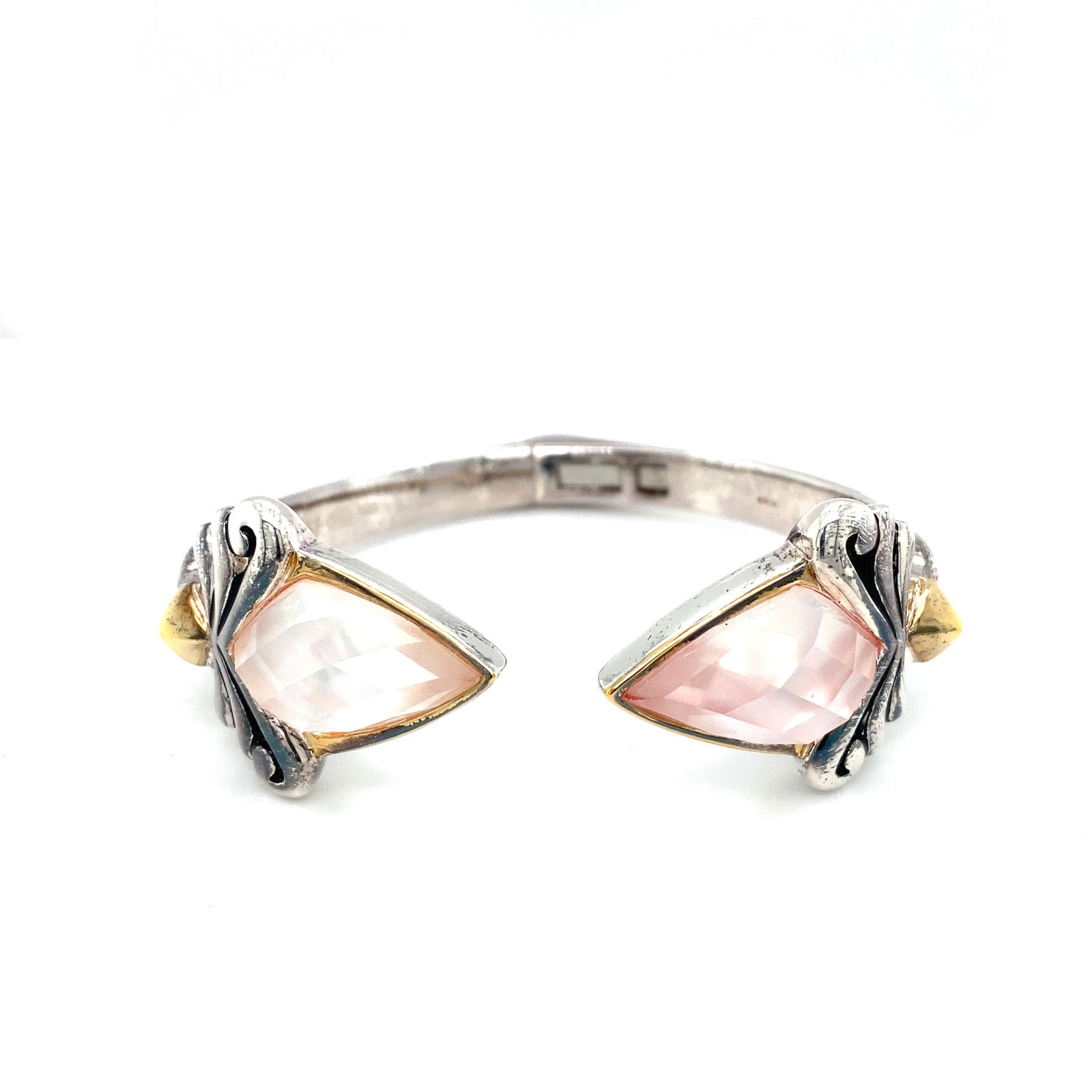 Stephen Webster Gold Tone and Sterling Silver Hinged Bangle Bracelet: Stephen Webster Sterling silver hinged bangle bracelet with faceted glass stones and gold tone accents, with maker's mark, 2.25" inner diameter, 55.6g Bracelet. LA209