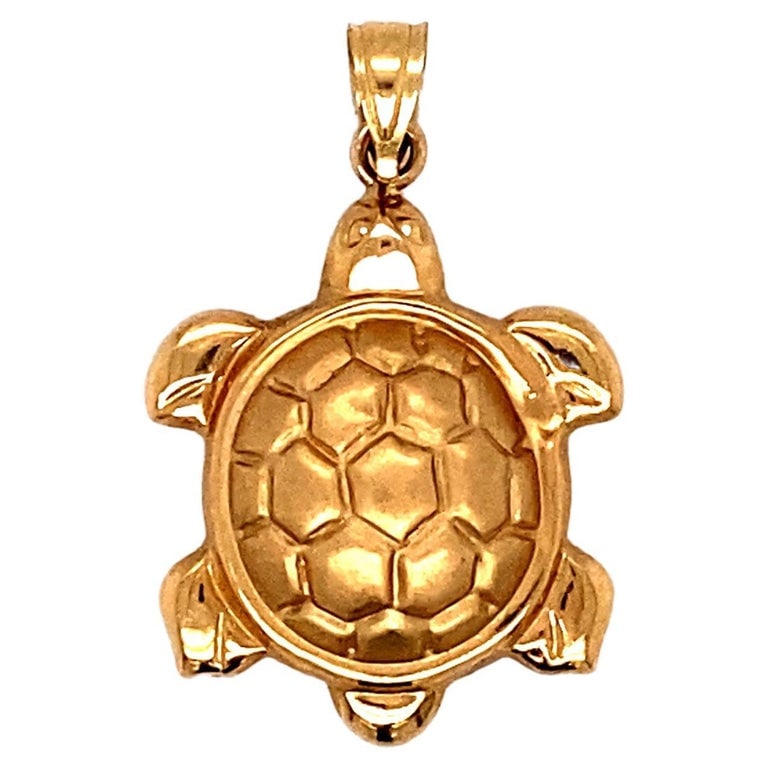 Sea Turtle Charm in 14 Karat Yellow Gold: Circa: 1980sMetal Type: 14 karat goldWeight: 0.9 gramsLength: 1 in. ATL152