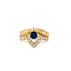 0.75 Carat Diamond and Sapphire 18 Karat Yellow Gold Ring