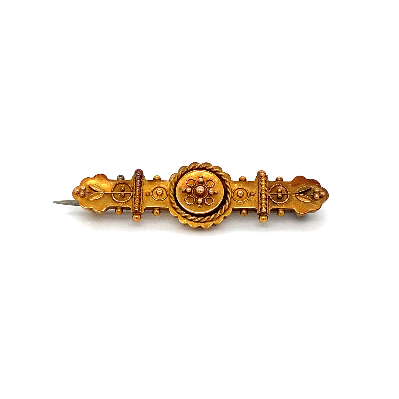 Victorian 15K Gold Brooch: Victorian, circa 1870s 15K gold brooch with ornate detailing and granulation work, 2.6g, with English hallmarks. 1.6"L