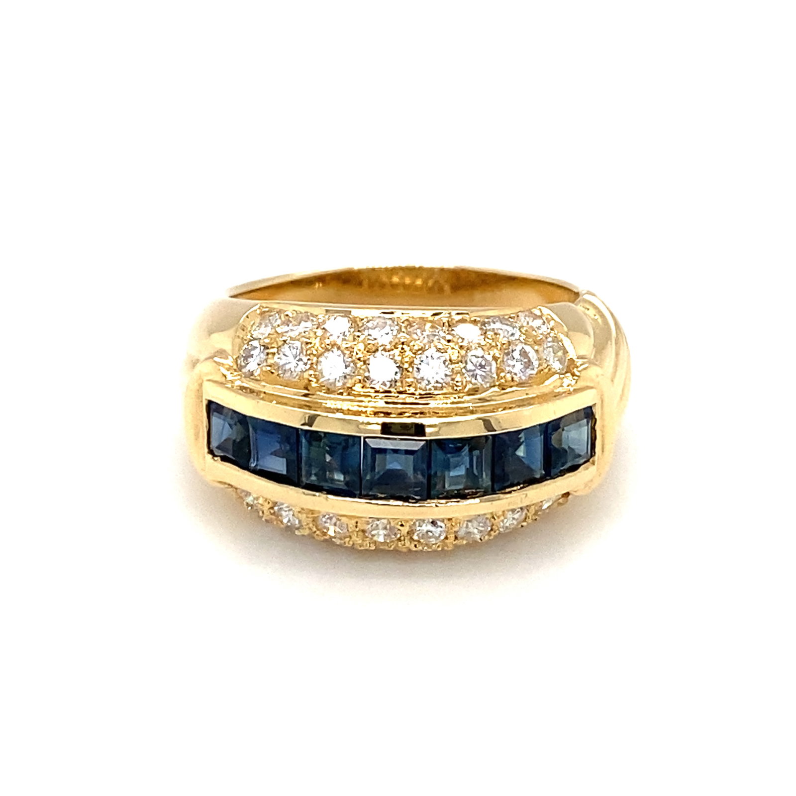 18K Gold Sapphire and Diamond Cocktail Ring: Estate 18k gold ring with step cut channel set sapphires at approximately 1.75ctw and pave accent diamonds at approximately 1.0ctw, SI clarity G color, size 6.75, 8.1g