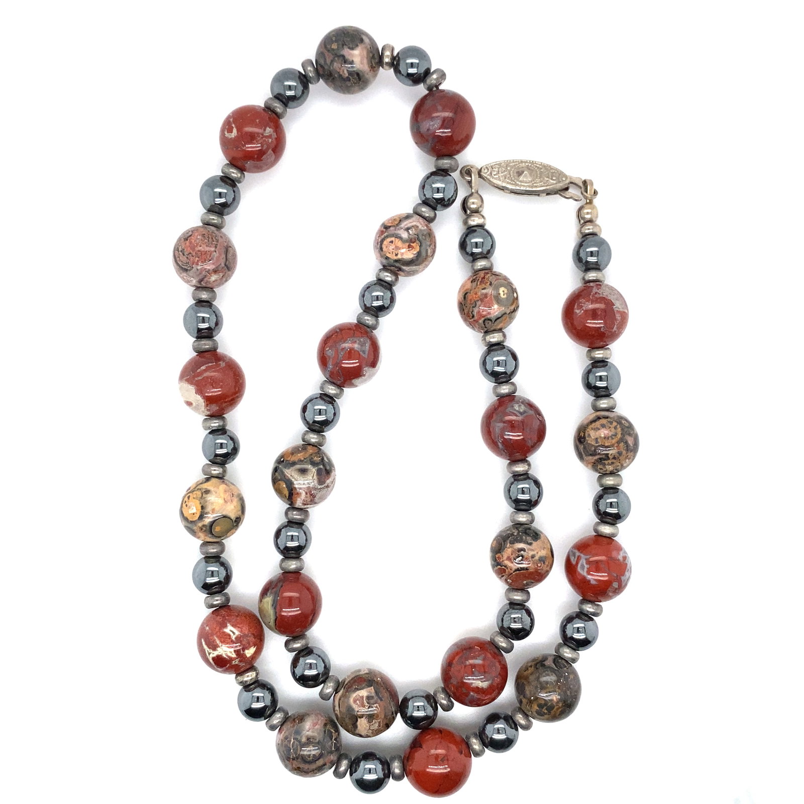 Agate and Hematite Beaded Necklace: Beaded necklace with agate and hematite beads with silver tone spacers and clasp, 19"L, circa 1970s