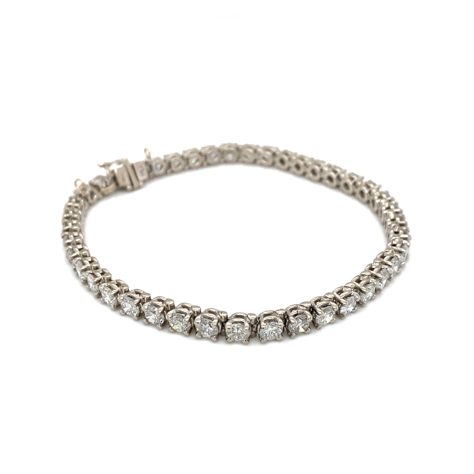 6.30 CTW Diamond Tennis Bracelet in Platinum: Metal type: Platinum, Diamond details: approximately 6.3 ctw, VS clarity, G-H color, Size: 7" Length, Weight: 21.5 g