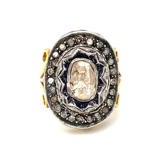 Mughal Reproduction Indian Rose Cut Diamond Cocktail Ring in 18 Karat Gold: Item Details: This ring is a reproduction of the jewelry popular in the Mughal period of India. It features a foil-backed oblong rose cut diamond in the center with a halo of accent diamonds. Circa: 2