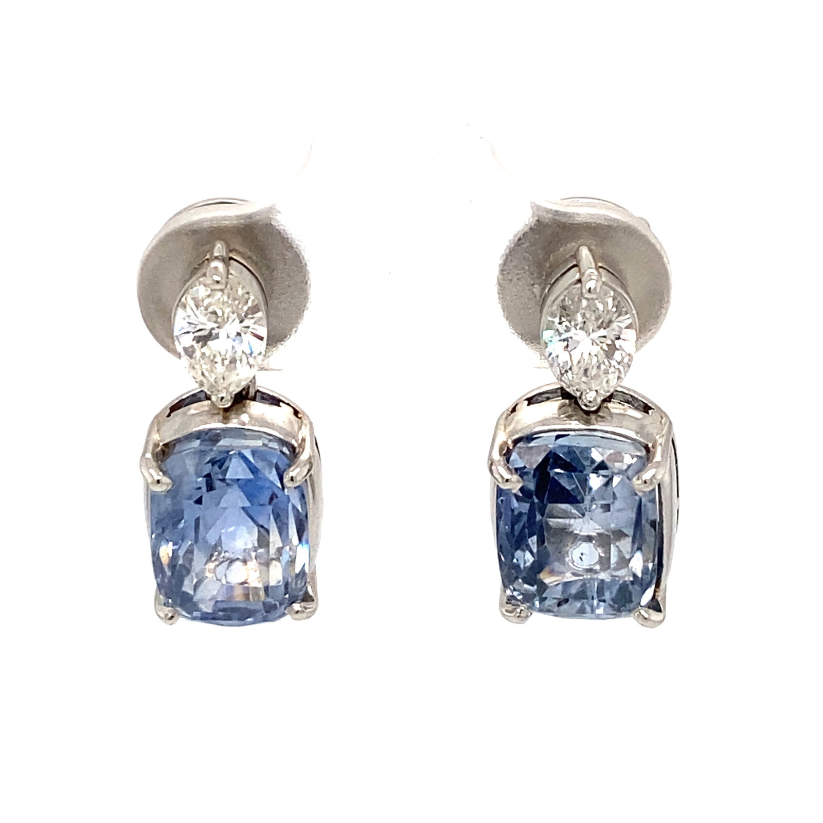 Sapphire and Diamond Earrings in Platinum: Metal type: Platinum, Sapphire details: Sapphire, cushion cut, 9 carats (4.5 carats each), Diamond details: Marquise diamonds, 0.70 cttw VS f/g, Dimensions: 23 mm Length, Weight: 9.3 g