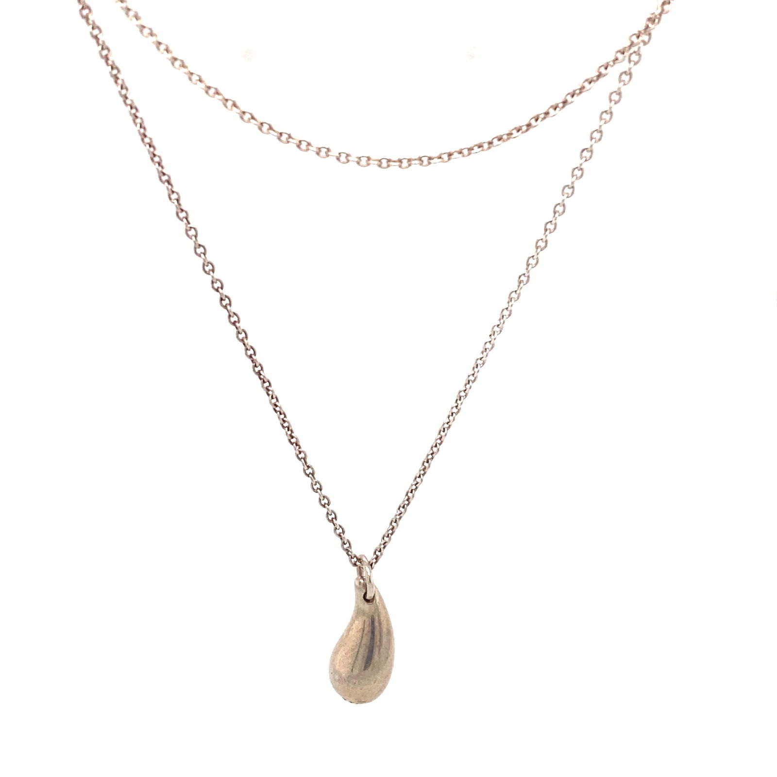 Tiffany & CO. Elsa Peretti Bean Necklace in Sterling Silver: Peretti, Metal type: Sterling Silver, Design: Bean pendant necklace, Pendant dimensions: 10 mm Height, Necklace dimensions: 20" Length, Weight: 3.1 g
