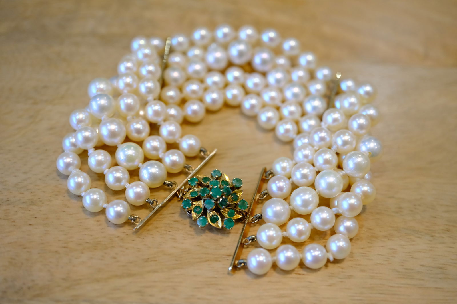 Five Strand Emeral and Pearl Bracelet in 14K Yellow Gold: Metal type: 14K Yellow Gold, Gemstone: Emerald and Pearl 5-7 mm diameter, Design: 5 strand bracelet, Dimensions: 7.5 " Length, Weight: 52.7 g