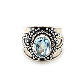 Oval Blue Topaz Ring in Sterling Silver
