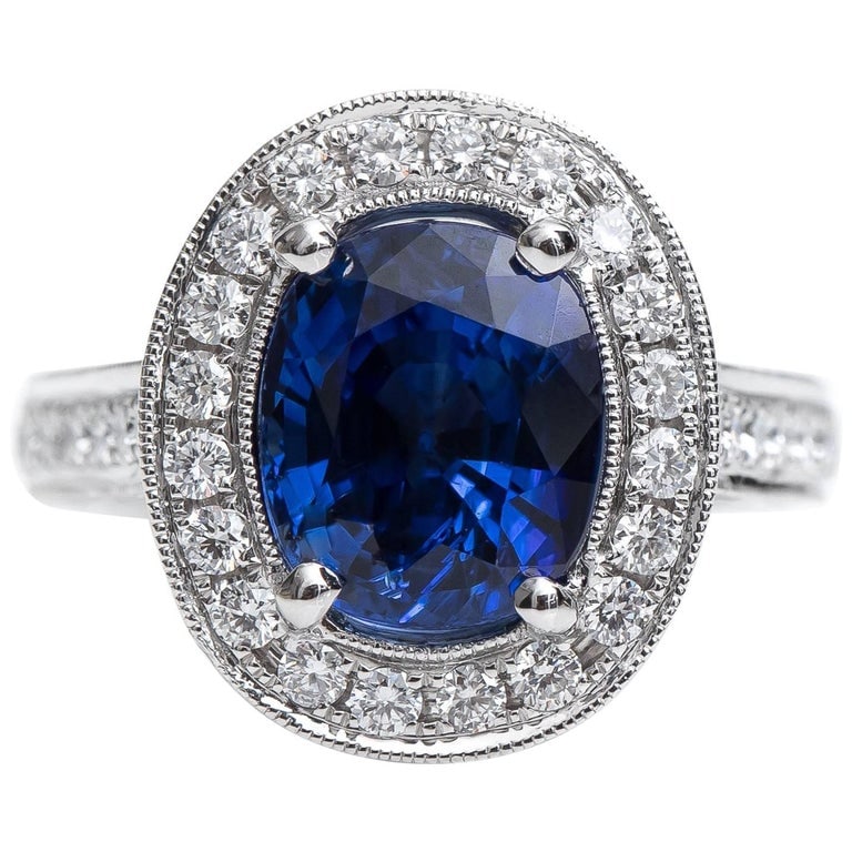 GIA Certified 3.75 Carat Cushion Oval Sapphire and Diamond Halo Ring (1 of 9)