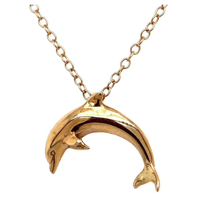 14K Yellow Gold Dolphin Pendant: 14k yellow gold dolphin pendant, dimensions 20 mm length, weight 1.78 grams, chain is not included