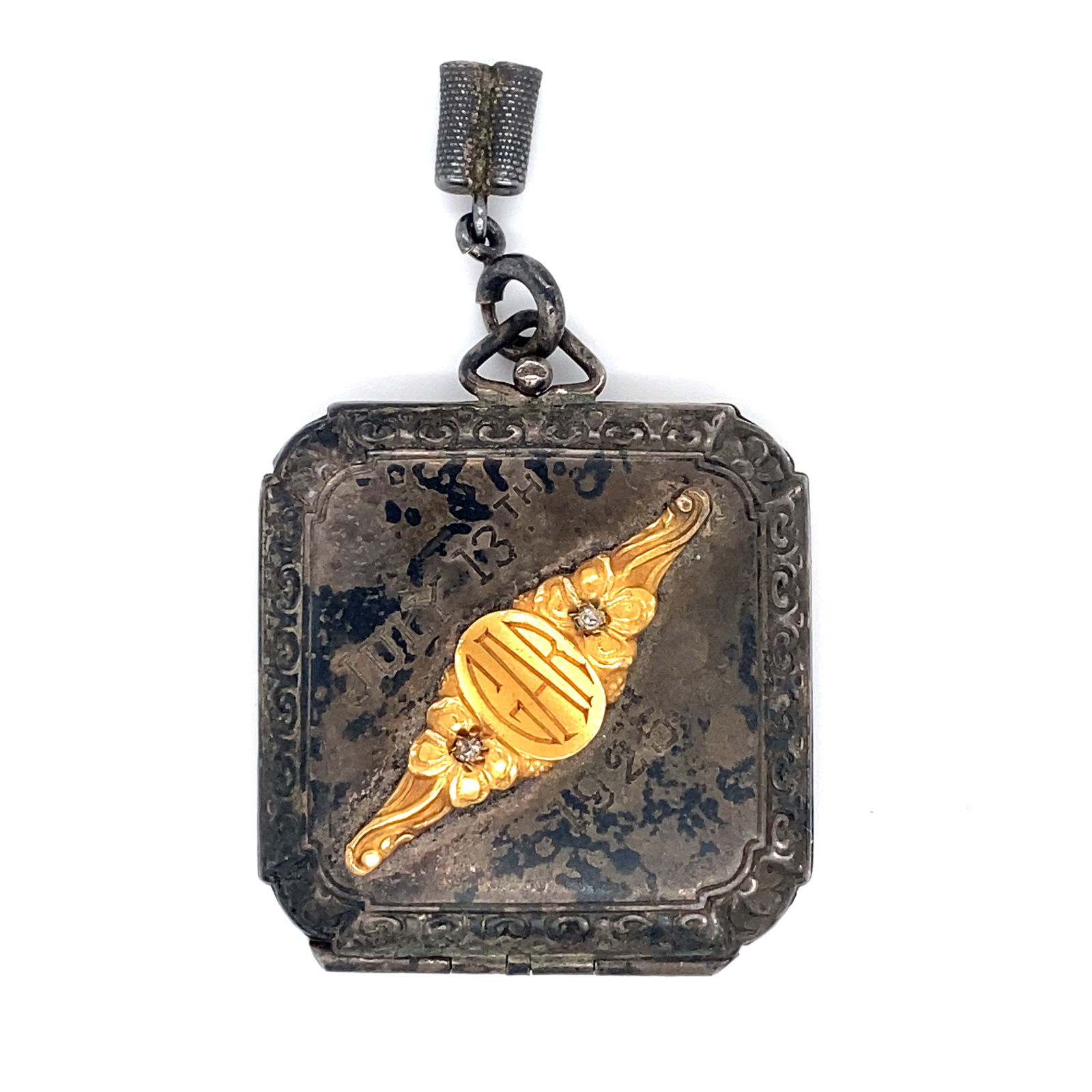 Circa 1925 Monogrammed Sterling Silver Locket with Photo and Lock of Hair (1 of 4)