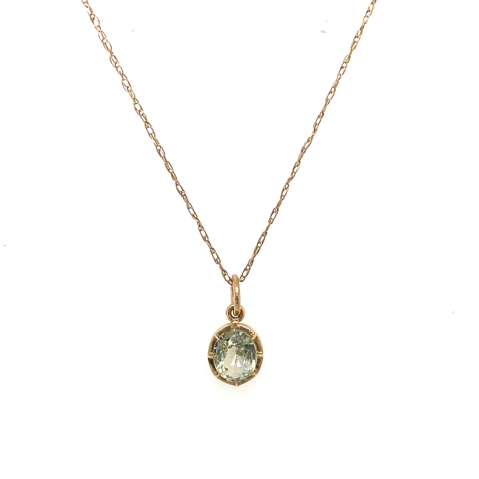 Natural Sapphire Pendant in14K Yellow Gold: Metal type: 14K Yellow Gold, Gemstone: Natural Sapphire 1.10 ct, 7 mm x 6 mm, Dimensions: 10 mm length including bail, Weight: 0.8 g. Chain not included.