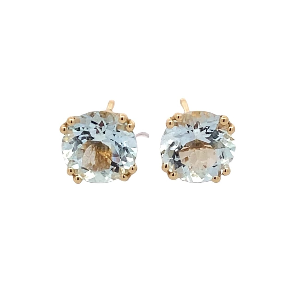 Vintage 14 Karat Yellow Gold Aquamarine Studs, 3 Carat Total Weight: 1.5 Grams Total Weight, 14 Karat Yellow Gold. Feature silicone backs. Aquamarines are Round brilliant cuts; held in double-four-prong setting; 3 Carats Total.