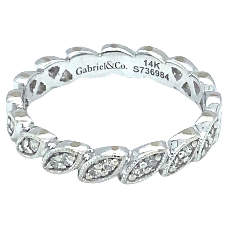 Gabriel & Co. Diamond Eternity Band in 14 Karat White Gold: 14 karat white gold ring by Gabriel & Co. with round diamonds. Size US 3.75, 2.0 grams.