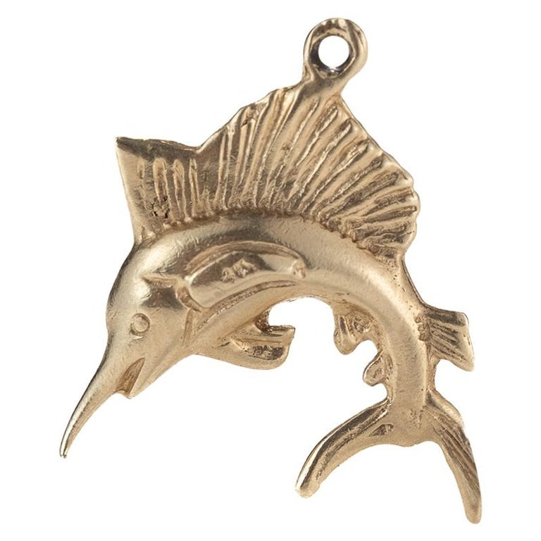 1950s Marlin Fish Charm in 14 Karat Yellow Gold: Circa 1950, 14 karat yellow gold marlin fish charm, weight 1.0 grams, dimensions 13 mm length x 15 mm height
