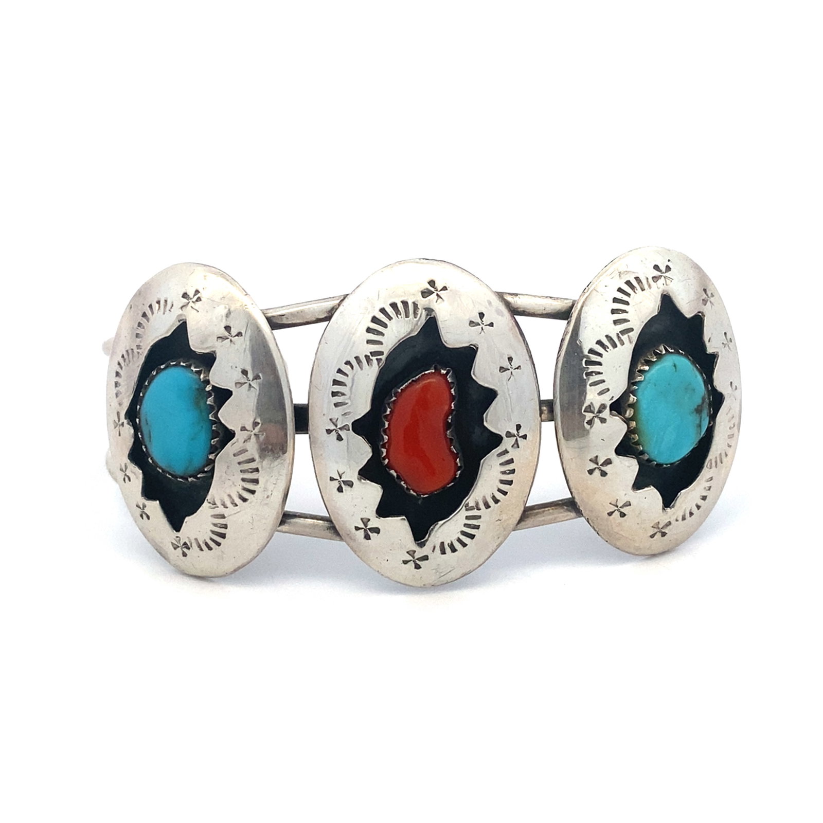 Native American Jefferson James Turquoise and Coral Bracelet in Sterling Silver: Native American, Jefferson James, Turquoise and Coral bracelet in sterling silver, measure: Approximately 2.25" width x 3cm height, Weight: 27.3 grams
