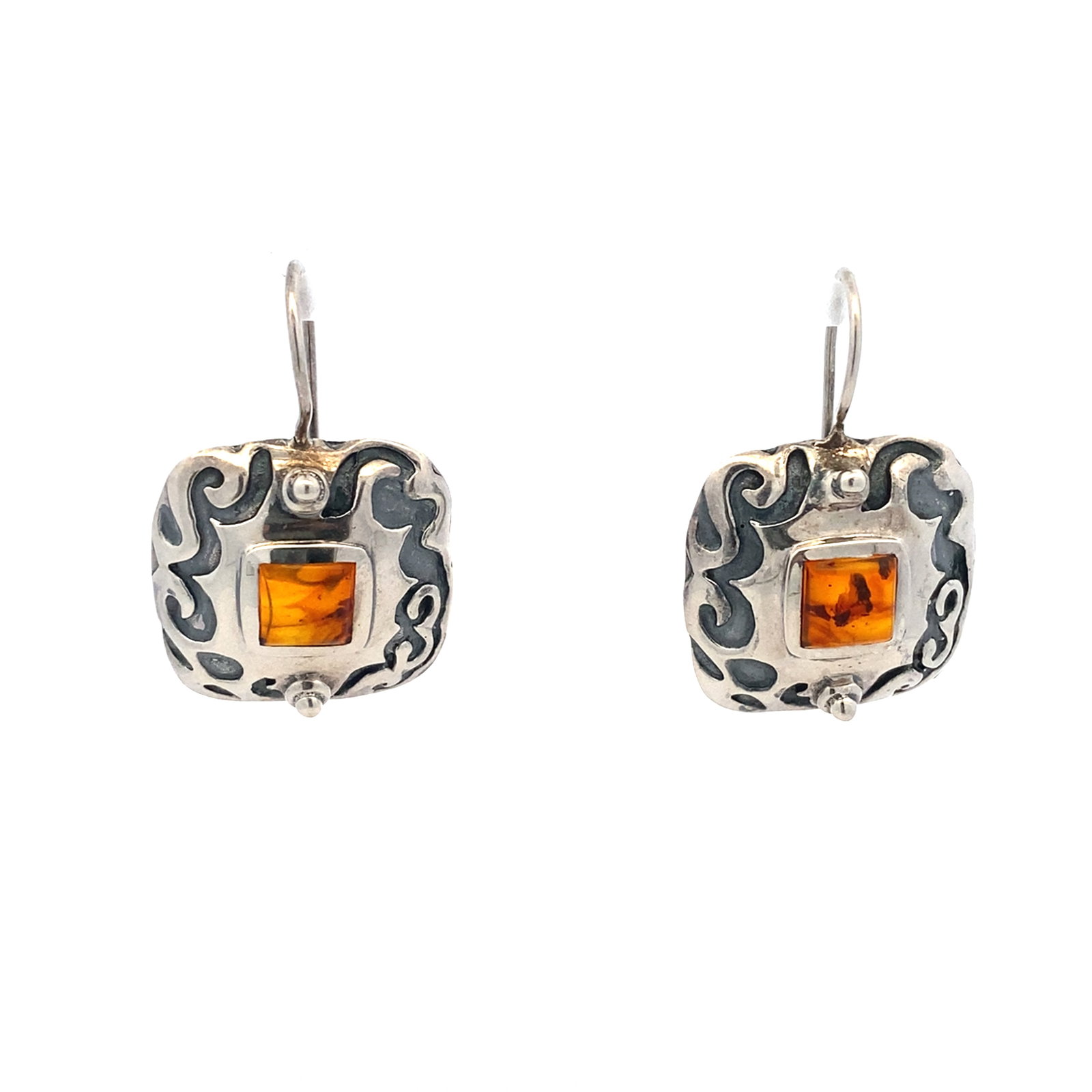 Vintage Amber Earrings in Sterling Silver: Era: Vintage, Metal type: Sterling Silver, Gemstone: Amber, Dimensions: 0.75" Width x 1.25" Height, Weight: 8.0 g