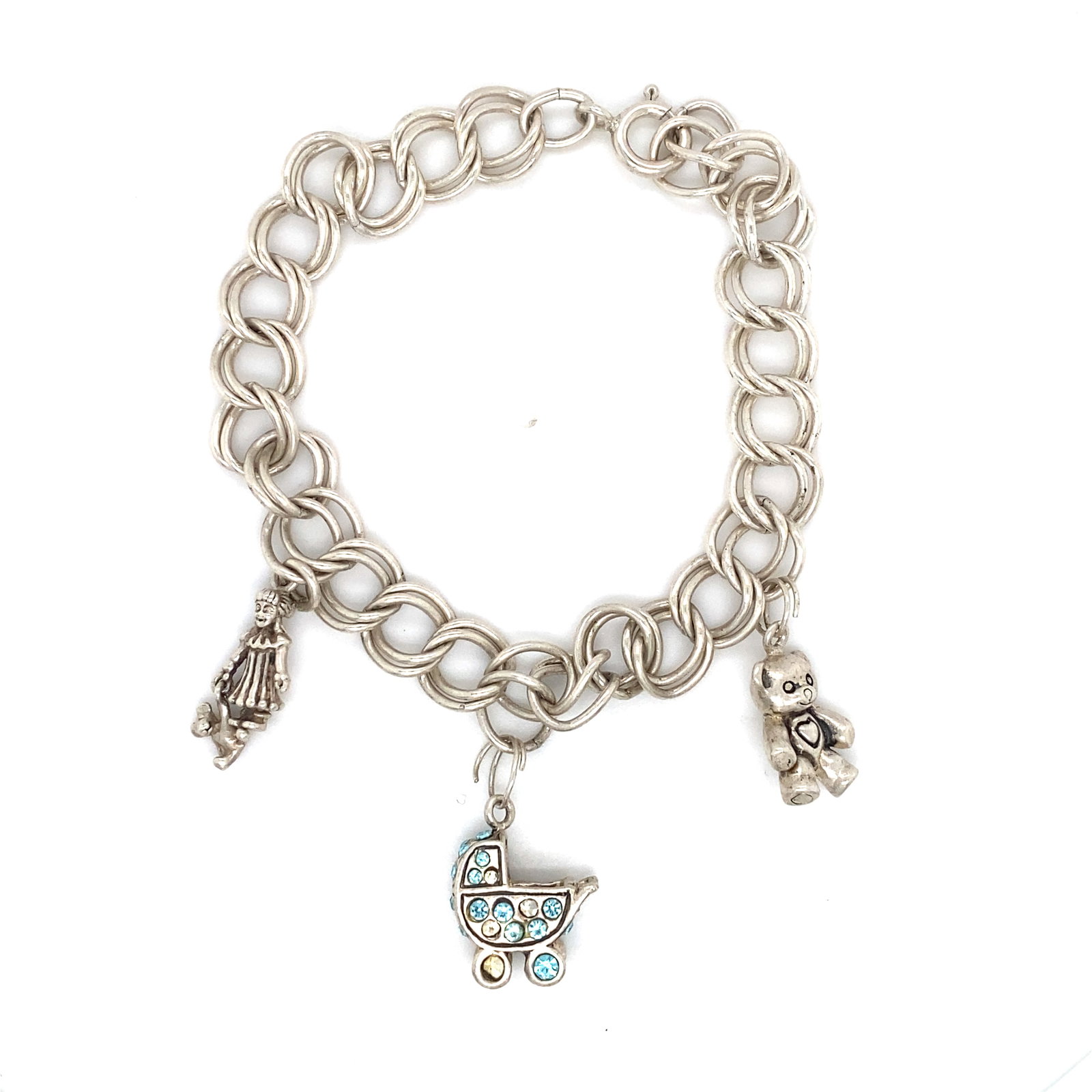 Vintage Oval Link Charm Bracelet in Sterling Silver: Era: Vintage, Metal type: Sterling Silver, Design: Oval link charm bracelet, Dimensions: 6.5" Length, Weight: 16.2 g