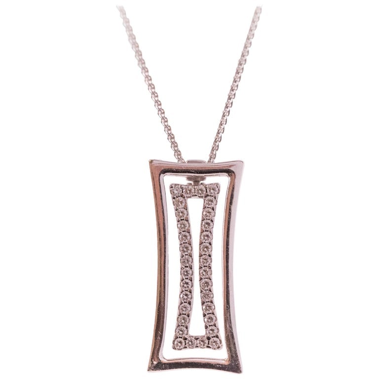 2014 Chimento Diamond and 18K Gold Pendant Necklace: Crica: 2014, Metal: 18 Karat White Gold, Gemstone: .40cttw VS, Measure: Adjustable 17 inches, 19.5 inches, 22 inches, 24.5 inches, Pendant Measurements: 2.5 centimeters long by 1 centimeter wide, Weig