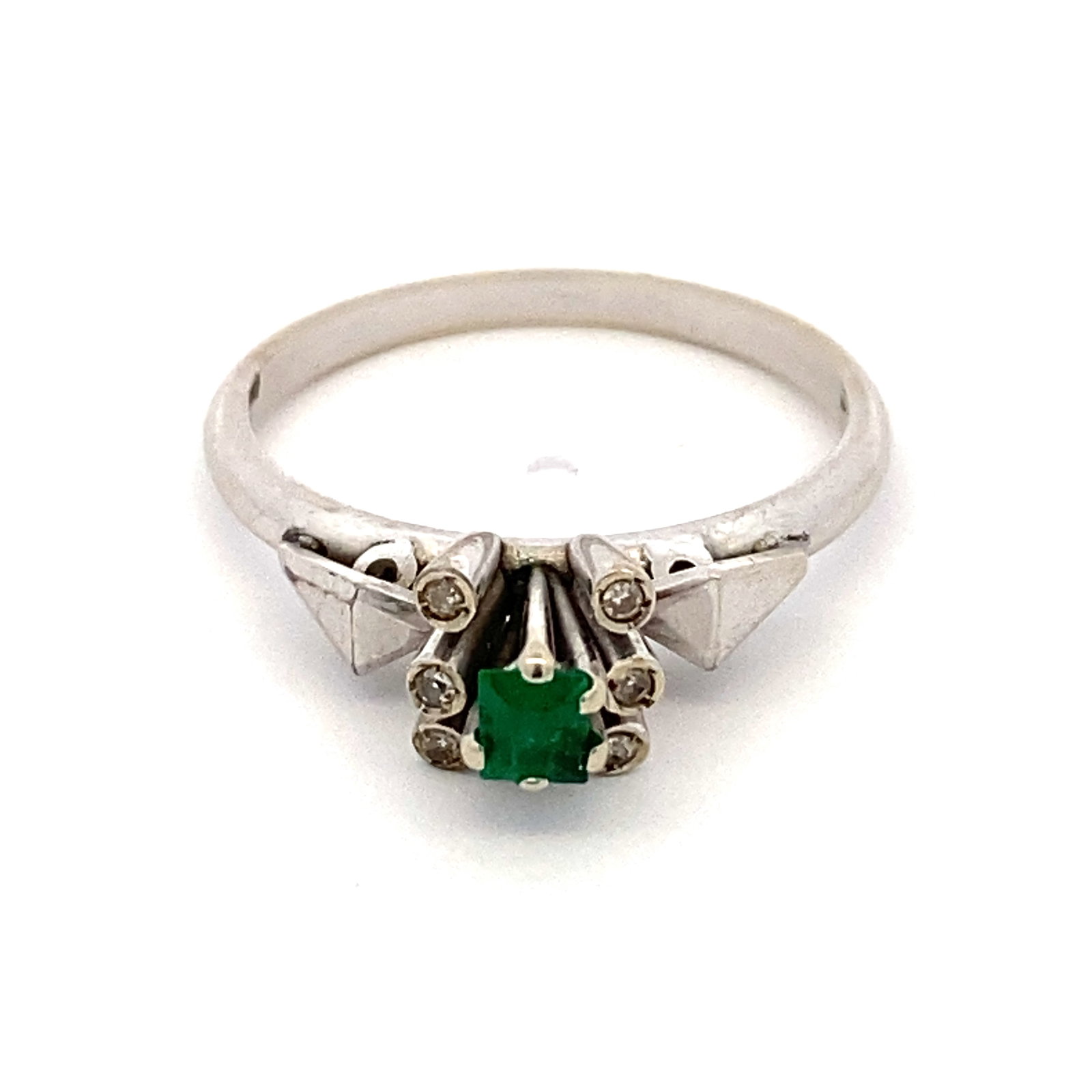 Emerald and Accent Diamond Ring in 18K White Gold: 18k white gold ring with one step cut rectangular emerald and accent diamonds, missing 1 prong on center stone. Size US 6.25, 2.89g