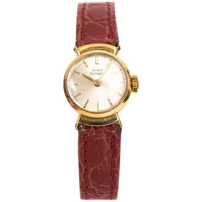 Girard Perregaux Ladies Yellow Gold Wristwatch, 1950s: Circa: 1950s, Girard Perregaux Ladies Wrist watch Yellow Gold Made in Switzerland Winding movement watch Patina on Metal. Hints of rainbow color on case. Weight 10g. Fits 7.5 inch, wrist Case Size:16 