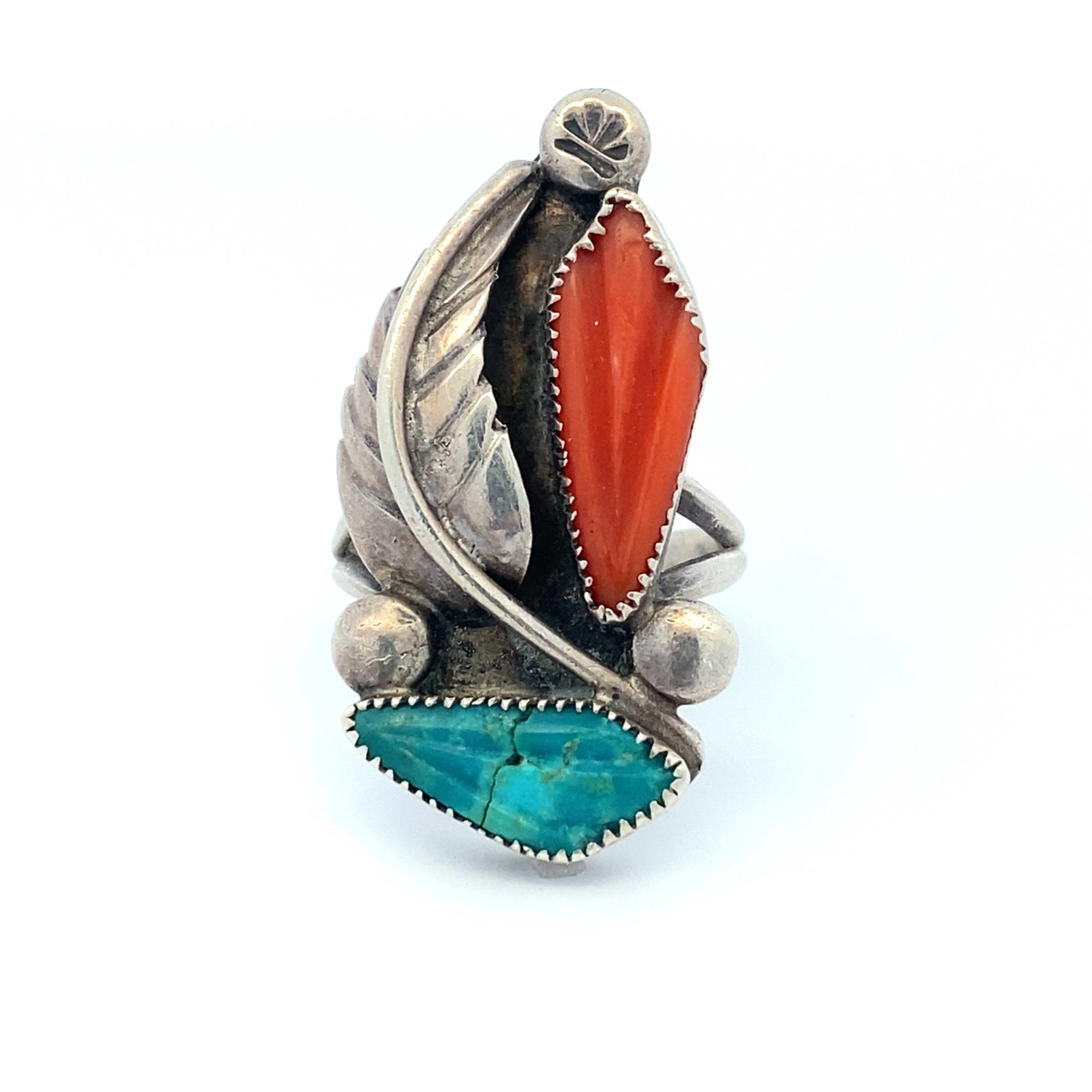 Sterling Silver Turquoise and Coral Ring: Vintage Native American sterling silver ring with feather design and carved coral and turquoise stones, stamped BE, size US 6.75, 8.3 grams