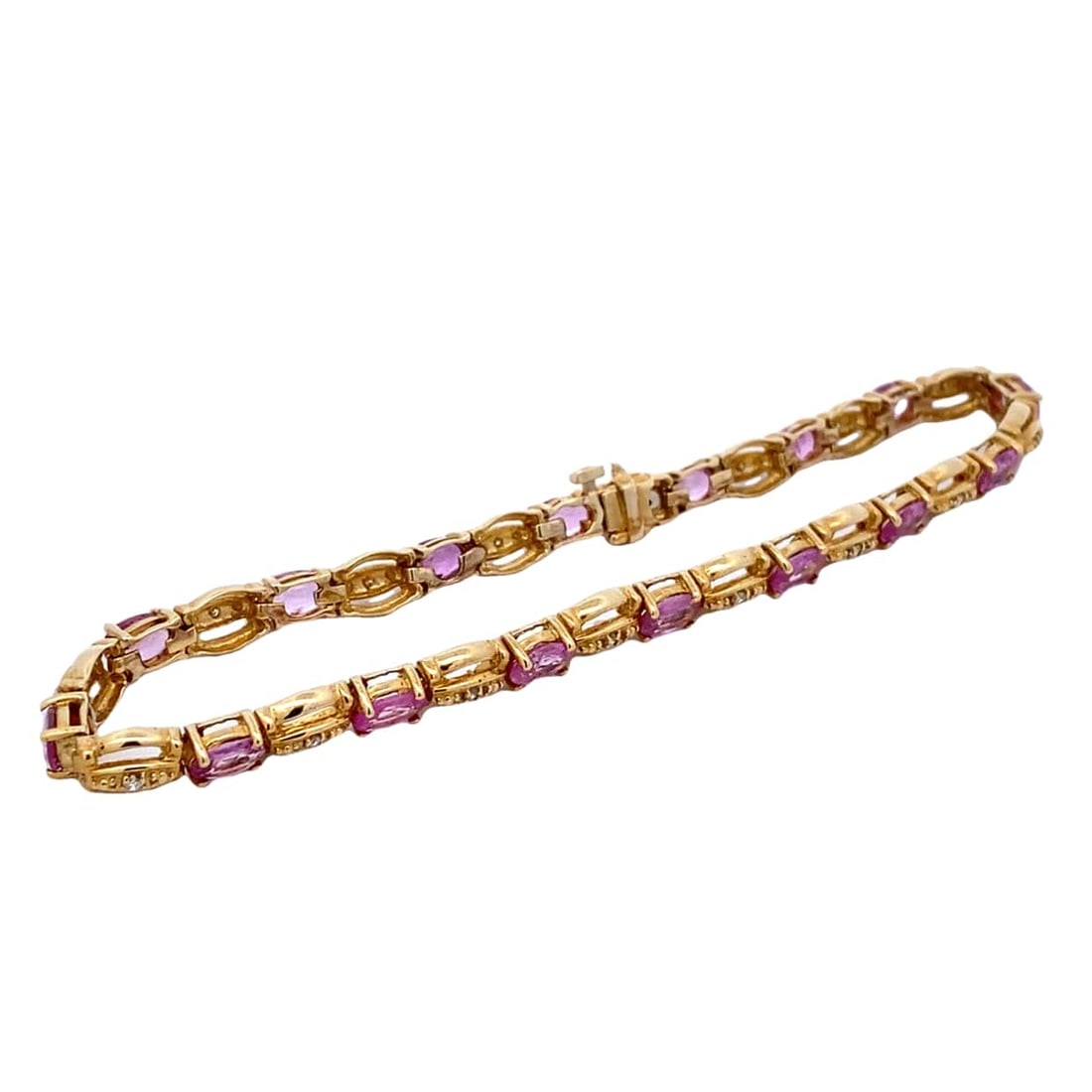 Estate Pink Sapphire and Diamond Bracelet in 14K Yellow Gold: Estate, Metal type: 14k yellow gold, Gemstones: Pink sapphire and diamond, Measure: 8.5" length, Weight: 14.8 grams