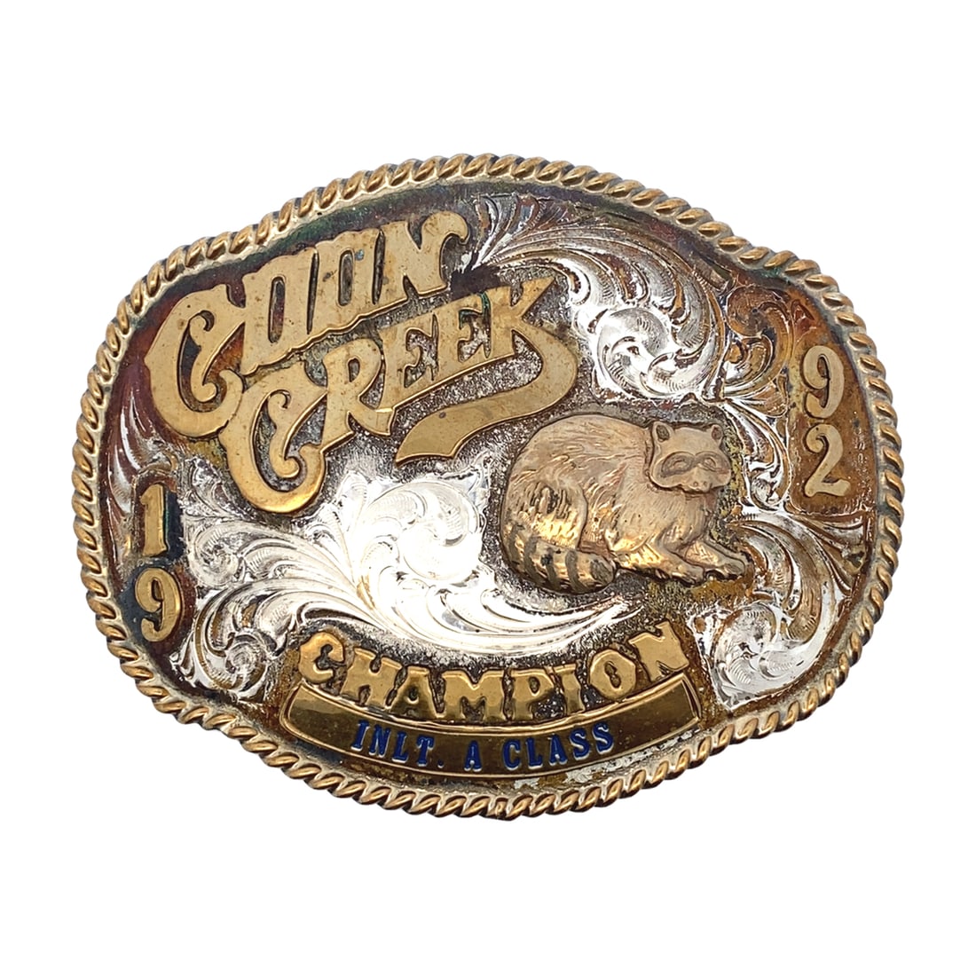 Coon Creek 1992 Champion Shooting Trophy Belt Buckle: Coon Creek 1992 INLT. A Class Champion shooting trophy belt buckle, 4"W x 3"H