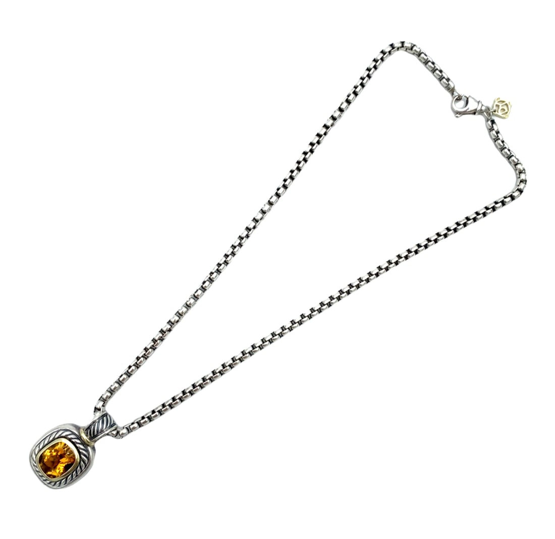 David Yurman Citrine Pendant Necklace in Sterling Silver and 14K Gold: Brand: David Yurman, Metal type: Sterling silver and 14k yellow gold, Stone: Citrine - 9 mm L x 1.2 cm H, Pendant measurement: 1.9 cm L x 3 cm H, Necklace measurement: 16" Length, Weight: 33.6 grams,