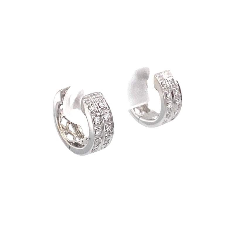 Diamond and 14 Karat White Gold Mini Huggie Hoops: 14 karat white gold mini huggie hoops with 0.30 carat total weight of diamonds, H color SI clarity. 4.5mm wide, 11.5mm diameter, 3.6 grams.