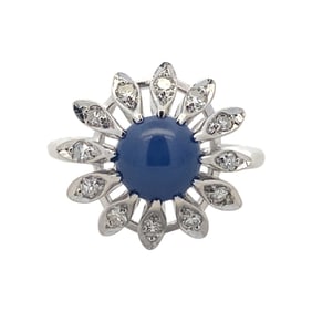 1950s 1 Carat Blue Star Sapphire, Diamond and 14 Karat White Gold Floral Ring