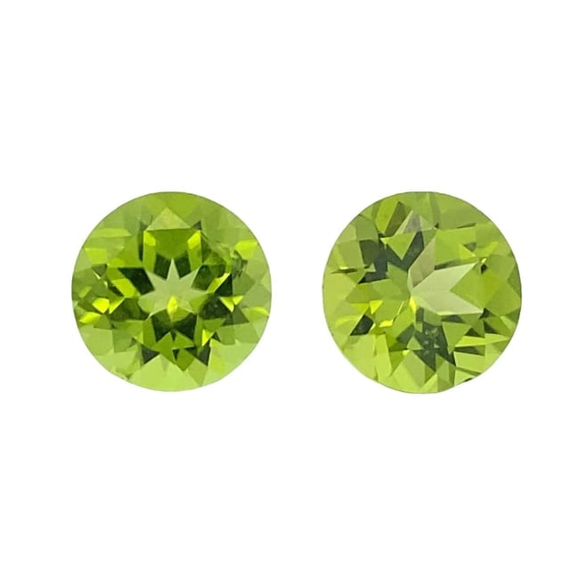 6.02 CTW Round Peridot Gemstone Pair: 3.01ct Each round peridot gemstone pair, 9mm each. Total carat weight 6.02 carats