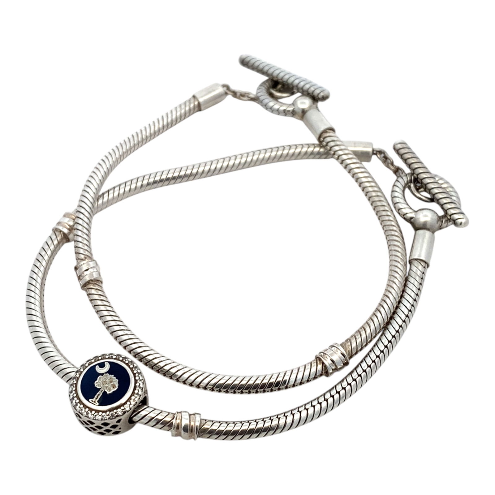 Estate Lot of 2 Pandora Charm Bracelet in Sterling Silver: Brand: Pandora, Metal type: Sterling Silver, Design: Lot of 2 charm bracelets, included one charm, Measurement: 7.5" - 8" Length, Weight: 29.8 grams