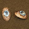 Oval Aquamarine and Diamond Omega Back Earrings in 18K Gold