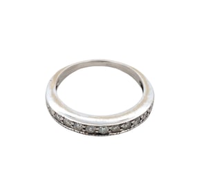 1990s 0.25 Carat Diamond and 14K Gold Eternity Band Ring