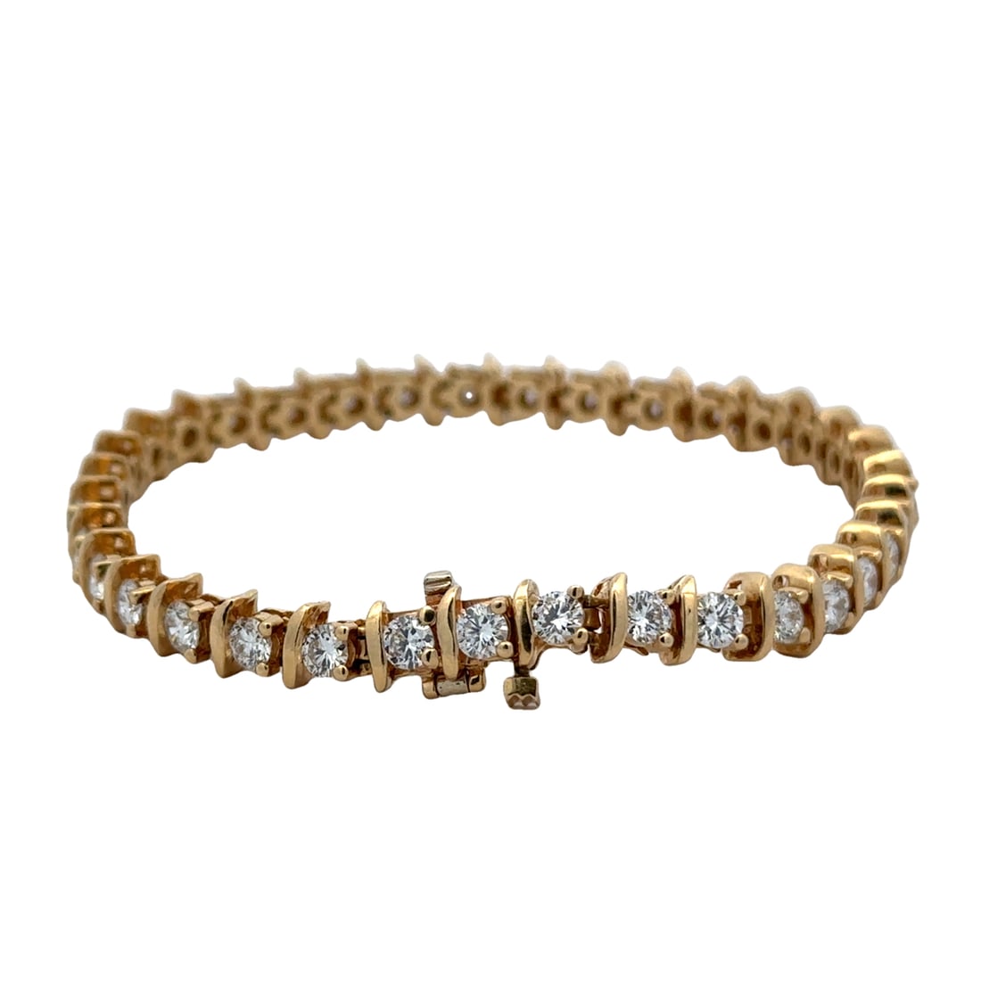 Estate 14k Yellow Gold 5.25CTTW Diamond Tennis Bracelet: Metal type: 14k yellow gold, Gemstone: 5.25cttw VS/SI diamond, Design: Tennis bracelet in good estate condition, Measurement: 6.75'' Length, Weight: 15.8 grams