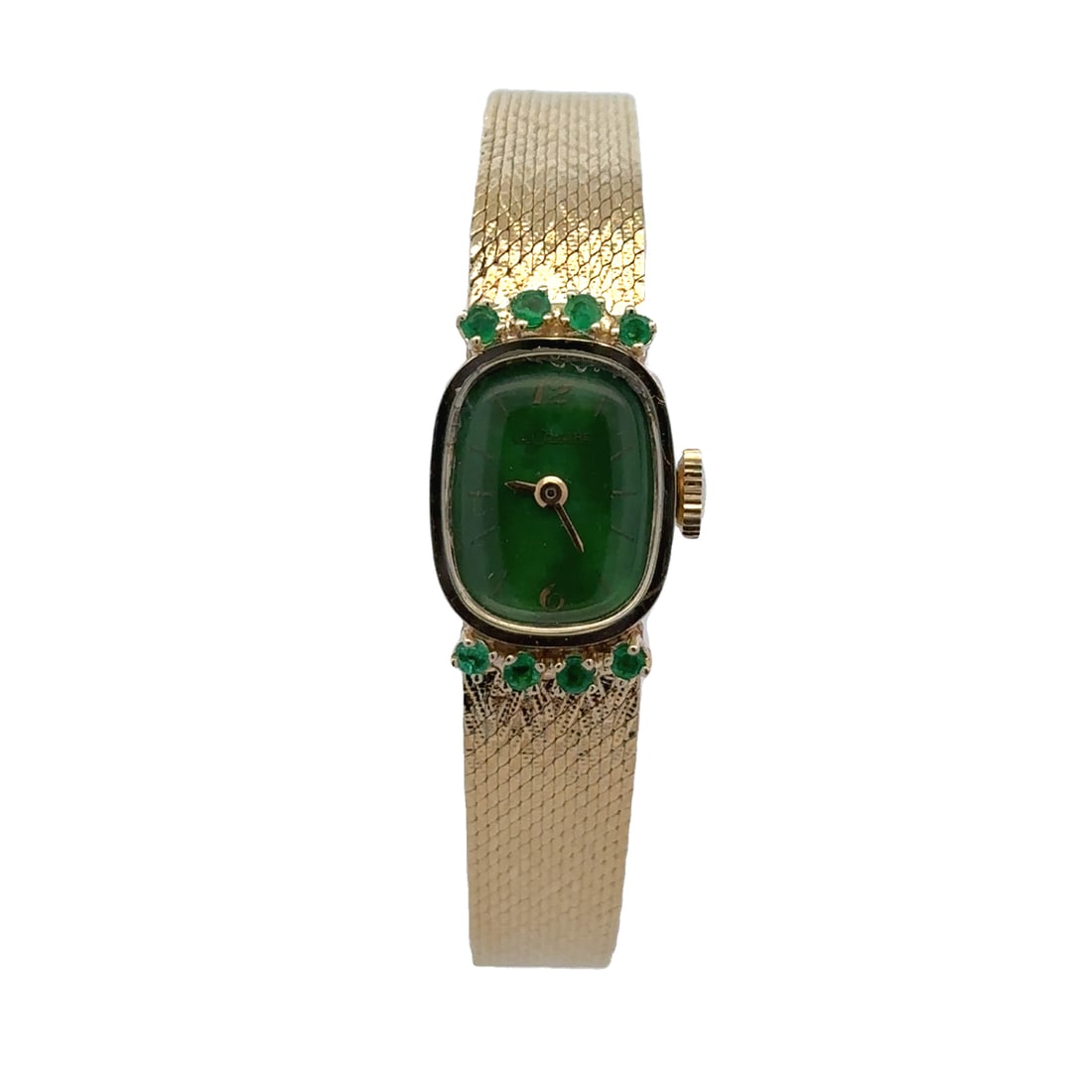 LeCoultre Emerald Watch in 14K Yellow Gold: Circa: 1940s-1960s, Designer: LeCoultre, Metal type: 14k yellow Gold, Gemstone: .18ct AAA round emerald, LeCoultre signed dial factory green colored dial, minor wear around crystal and watch, watch ru
