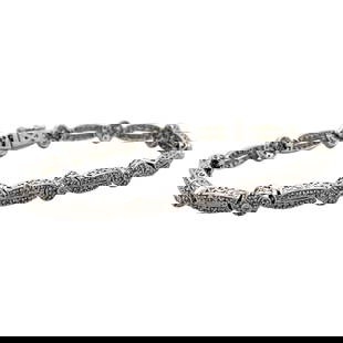 Diamond Tennis Bracelet in 14K White Gold: Metal type: 14k white gold, Gemstone: .90cttw VS/SI diamond, Measurement: 7" Length, Weight: 14.4 grams