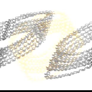 Vintage Multi-Strand Pearl Bracelet with diamond in 14K White Gold: Vintage, Metal type: 14k white gold, Gemstones: Pearl - 4 mm diameter and diamond, Design: Multi-strand bracelet, Measurement: 5" Length, Weight: 28.9 grams