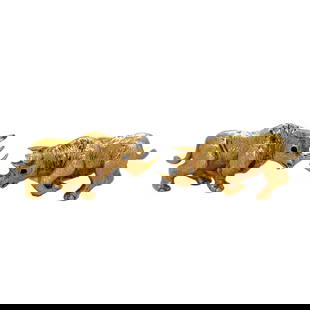 Tiffany & Co. Sapphire Rhino Cufflinks in 18K Yellow Gold: Brand: Tiffany & Co., Metal type: 18k yellow gold, Gemstone: Sapphire, Design: Rhino cufflinks, Measurement: 1" Length, Weight: 22.6 grams