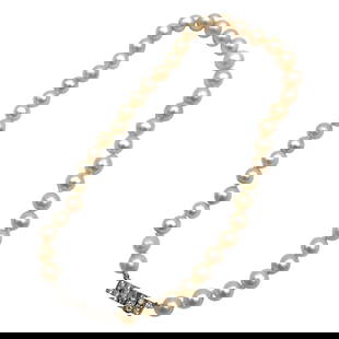 Estate Pearl Strand Necklace with Diamond Clasp in 18K White: Estate, Metal type: 18k white gold, Gemstones: .60 ct VS/SI diamond and pearl (8 - 9.5 mm diameter), Measurement: 15" Length, Weight: 33 grams