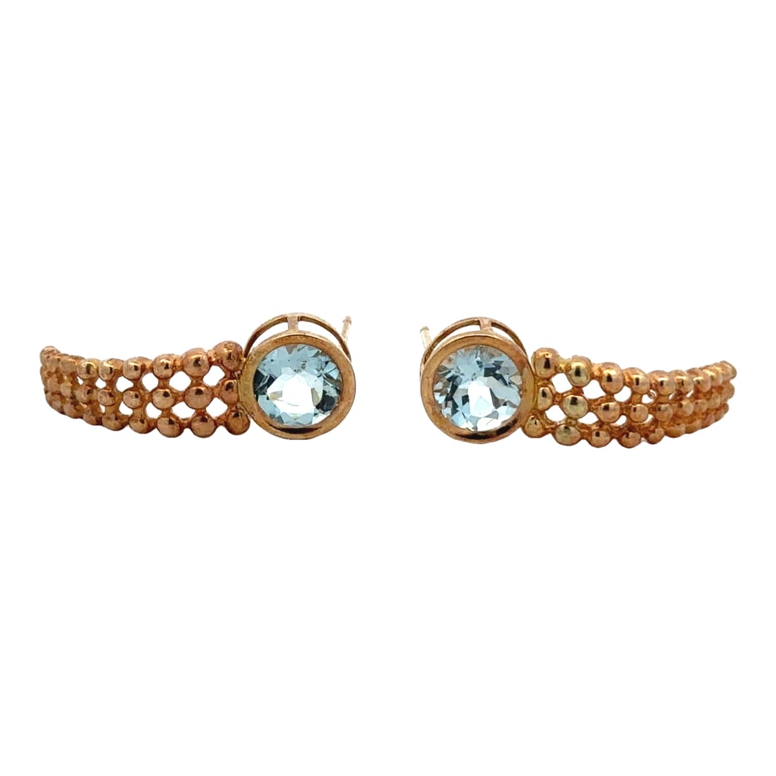 Blue Topaz Mid Century Curved Earrings in 10K Yellow Gold: Circa: 1950s, Metal type: 10k yellow gold, Gemstone: Blue topaz , Design: Lovely curve earrings, no back, Measurement: 2 cm Length, Weight: 2.4 grams