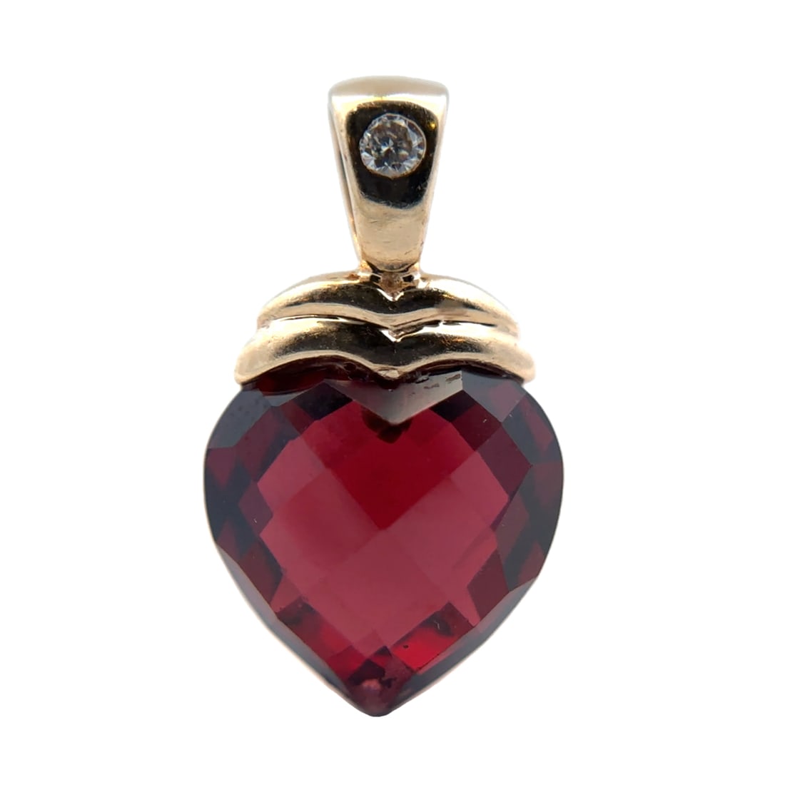 Heart Shaped Garnet and Diamond Pendant, 14K Gold: 14 karat yellow gold pendant with faceted heart shaped garnet gemstone and one accent diamond, 17.6mm L, 1.65g