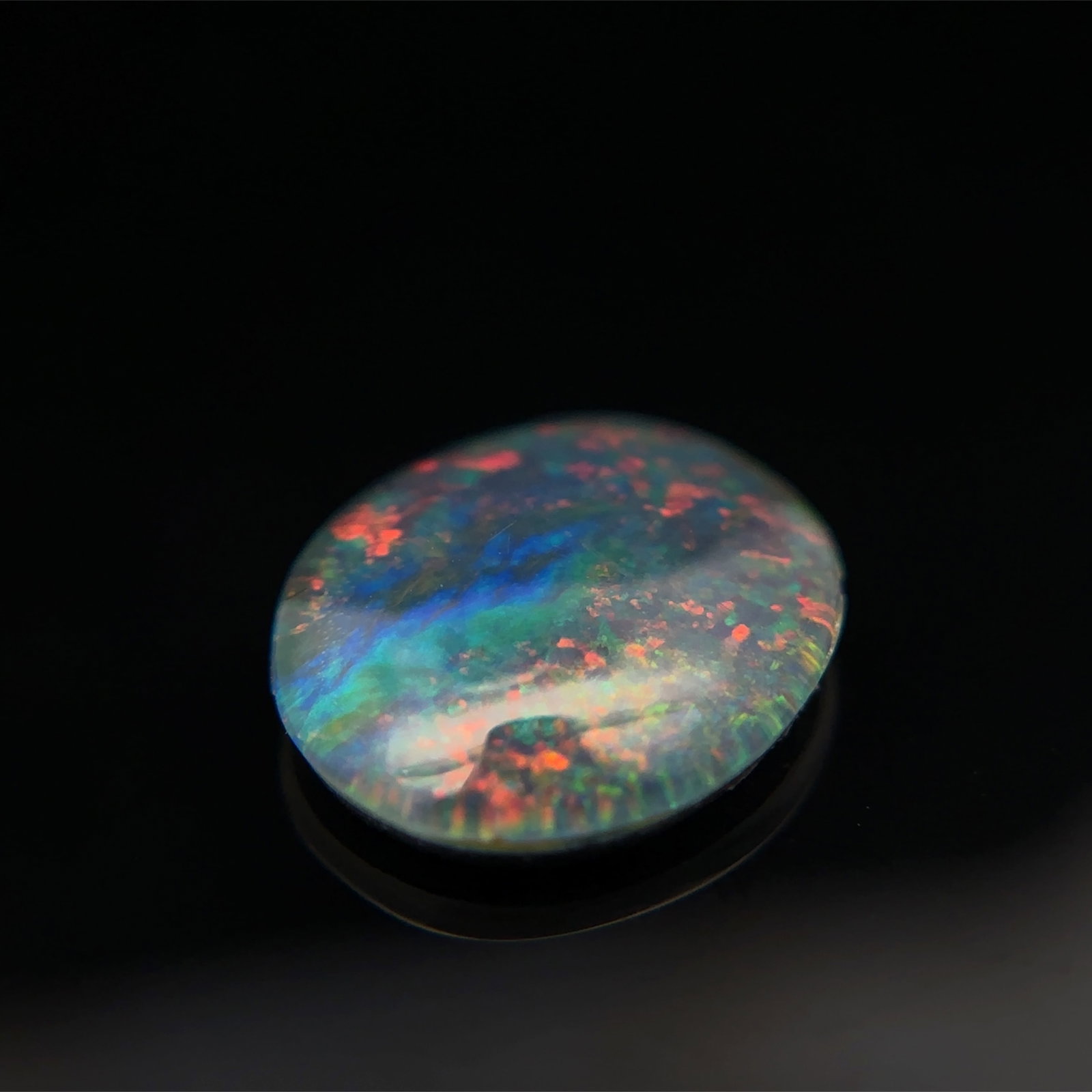 Vintage Black Opal Triplet Stone: Vintage black opal triplet stone, 2.5cts, 12x10mm, with original box